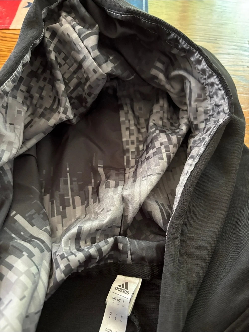 adidas Black Hoodie with Repeated 'Determination Over Negativity' Chest Graphic